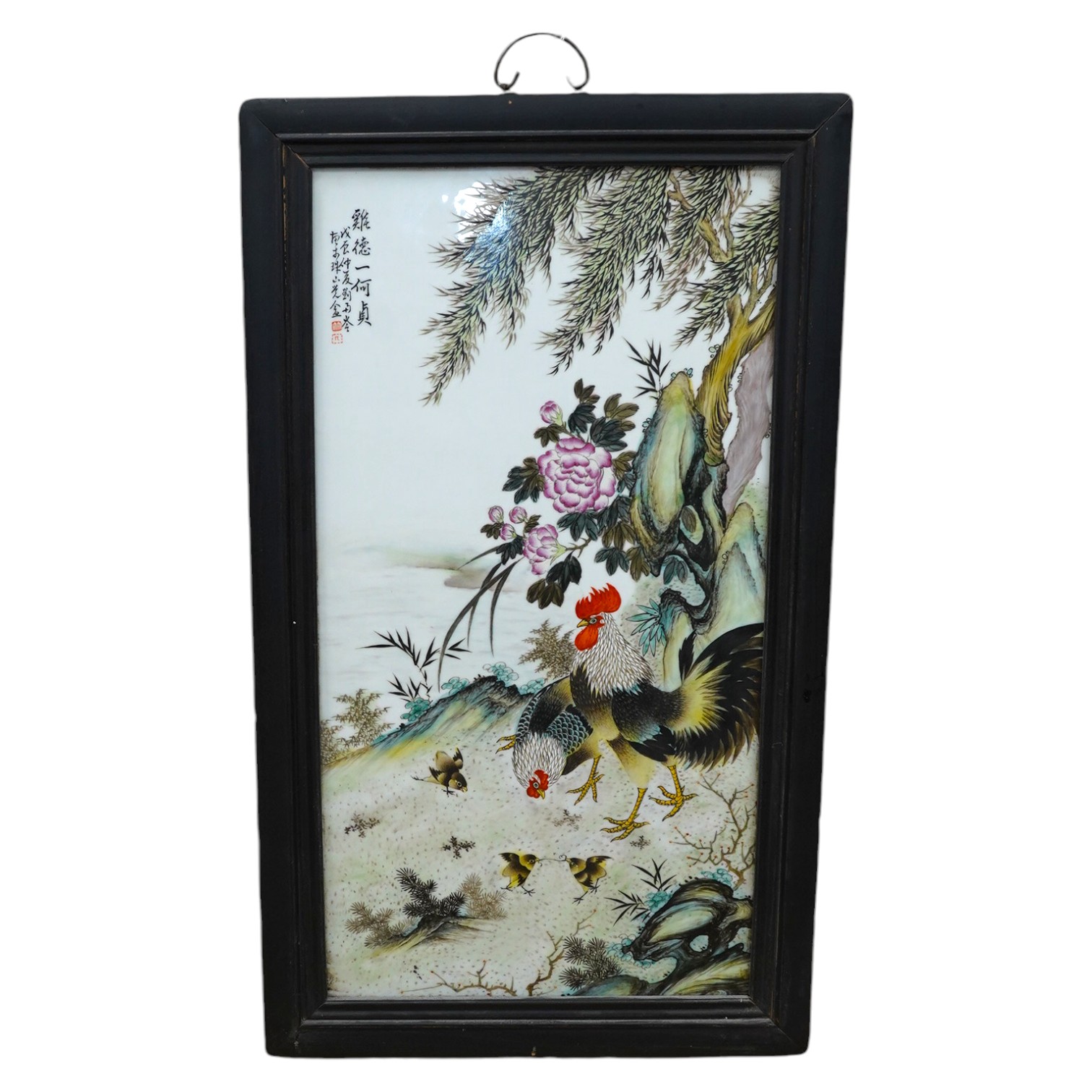 A Chinese famille rose porcelain plaque depicting cockerels and chicks before a landscape, signed with character marks and red seal mark, framed, 95cm high. Condition - good